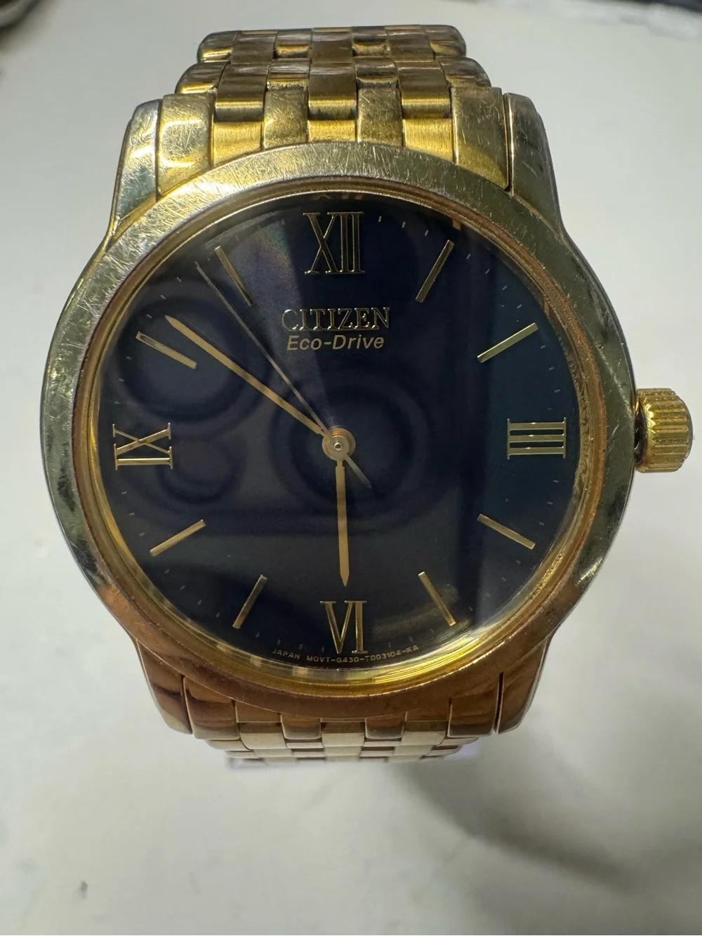 Citizen Gold Tone Men's Watch with Black Dial and Roman Numerals